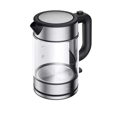 Clear glass electric kettle with black handle and lid on a white background